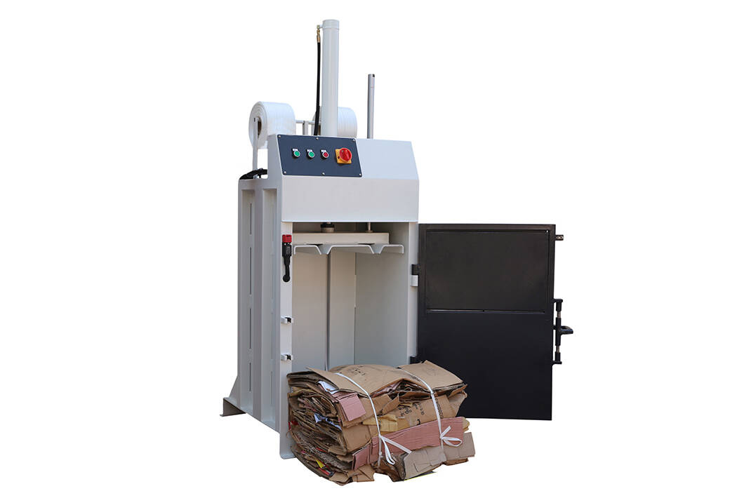 China Vertical Cardboard Baler Vertical Baler to compact cardboard, plastic film, paper waste, alumnium can, textile and oil drum
